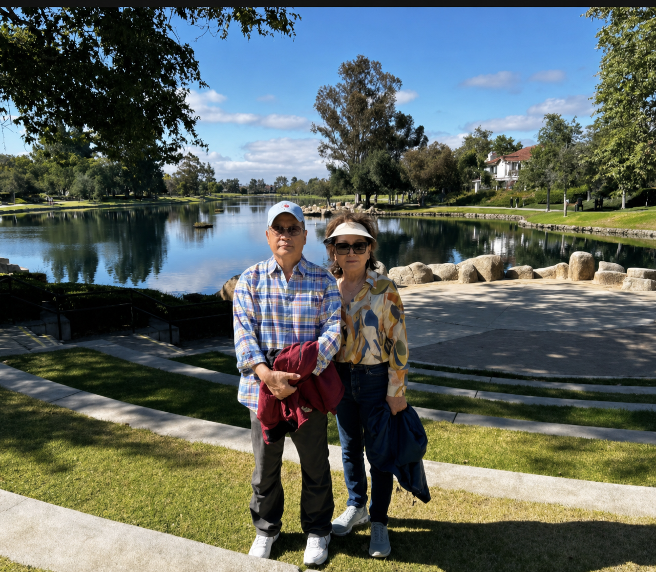 Adam's parents on a walk by the lake